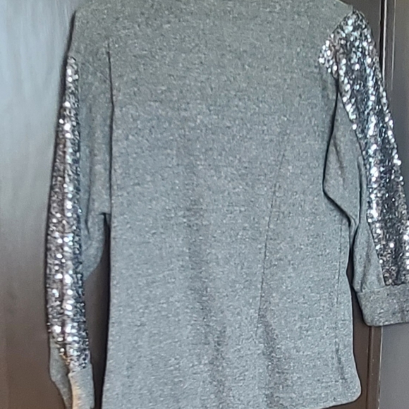 Wonens 3/4 sleeve gray shirt with silver sequin sleeves. - Picture 2 of 2